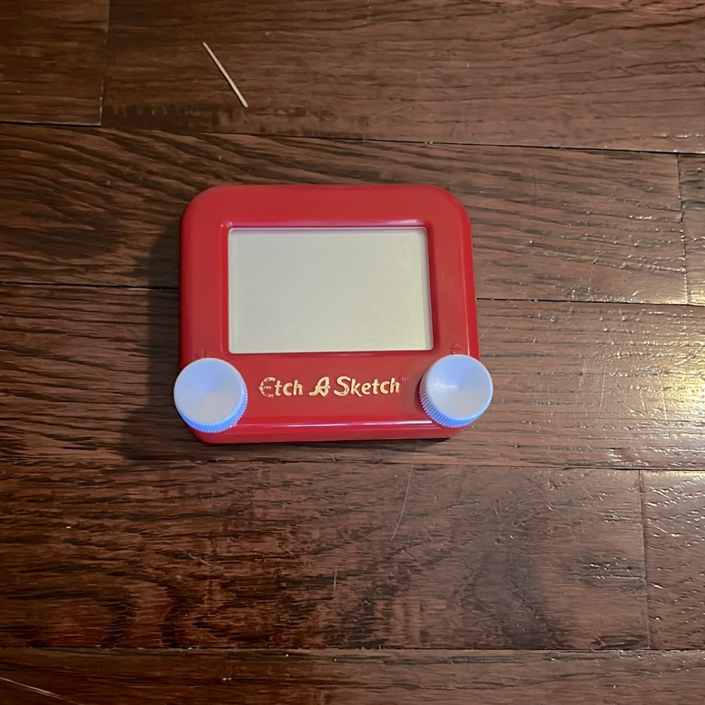 Etch a sketch is where you can draw any thing you want!!
